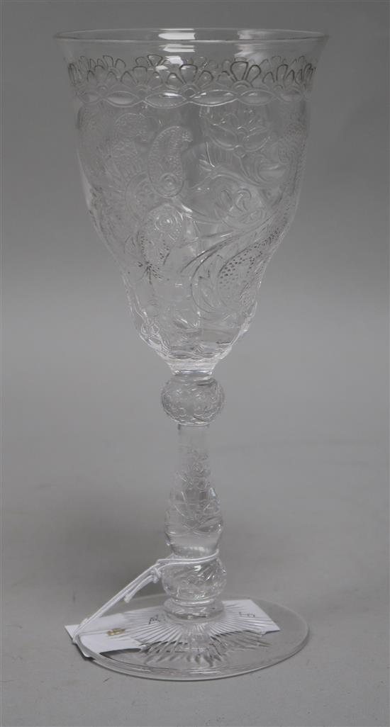 A tall etched wine glass, with ogee bowl and knopped stem, all over scrolling foliate, 8.25in.